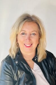 Headshot of Nicole Hilgenkamp, an expert in business operations and digital transformation.