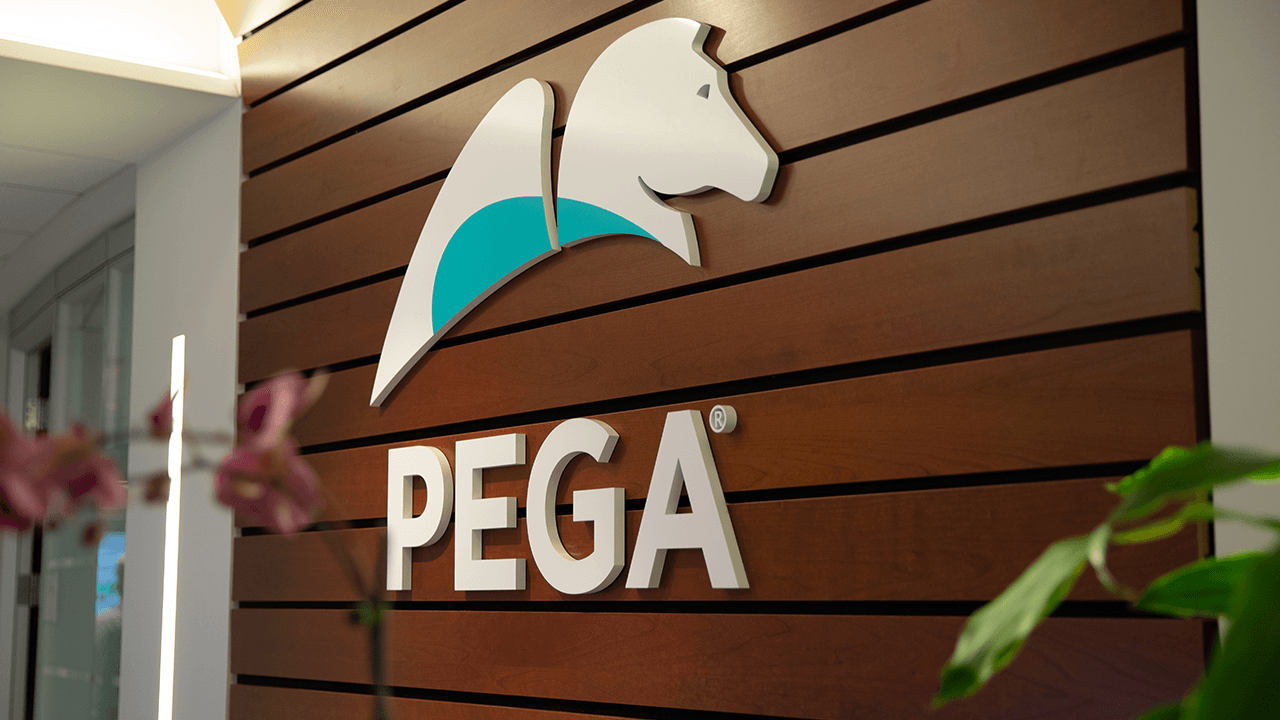 Logo of Pegasystems on the wall of Cambridge Office