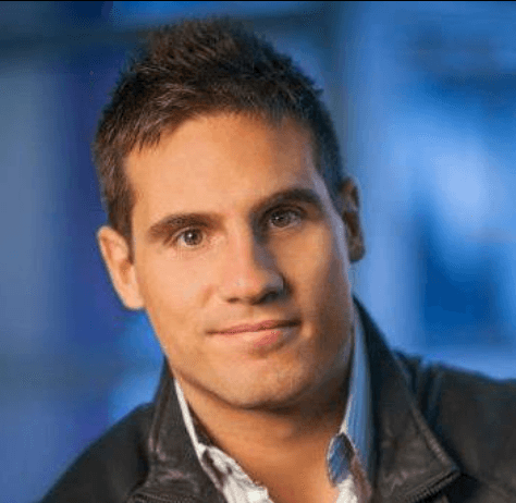 Headshot of Zeke Camusio, founder of Data Speaks, smiling.