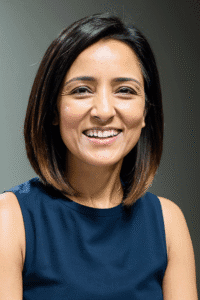 Professional headshot of Aarti Anand, guest on the Innovation Tales podcast